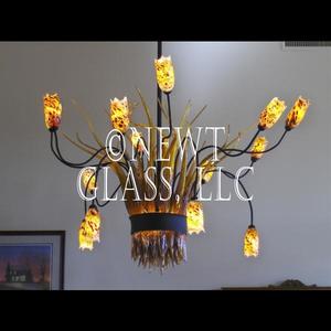 Light Fixture With Multiple Lamps
 
	This fixture was designed to create a lot of light up and down for a dining room area
