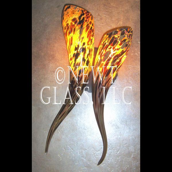 Horn Sconce
 
	Two lighted horns for a sconce in bathroom
