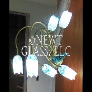 Vanity Sconce
 
	Pair of vanity sconces installed on a mirror for lighting in all directions
