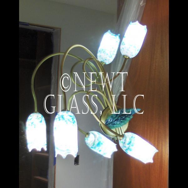 Vanity Sconce
 
	Pair of vanity sconces installed on a mirror for lighting in all directions
