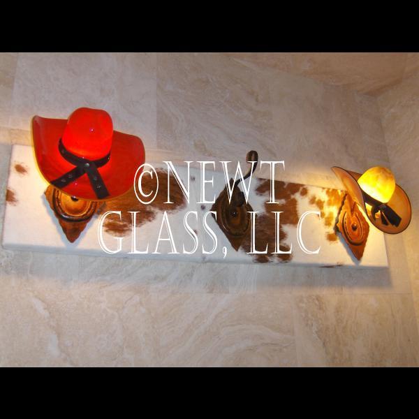 Cowboy Hat Rack
 "Hat Rack" light fixture for bathroom vanity area with two decorated cowboy hat lights, leather backing and hat hooks